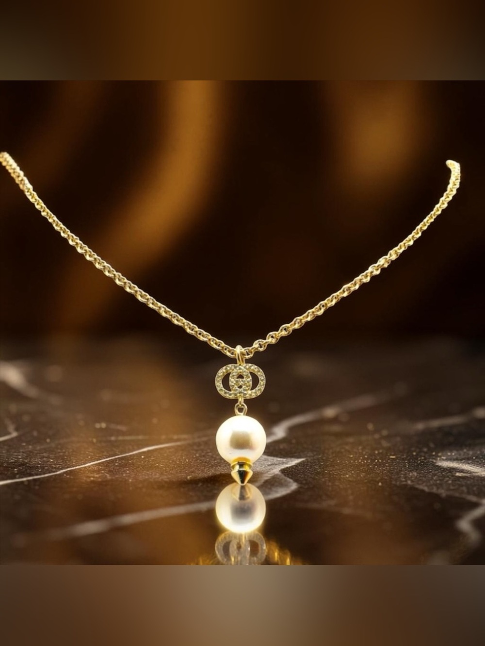 Gucci Gold Plated Pearl Pendant Nexklace w Gucci GG Logo in Shiny Crystals